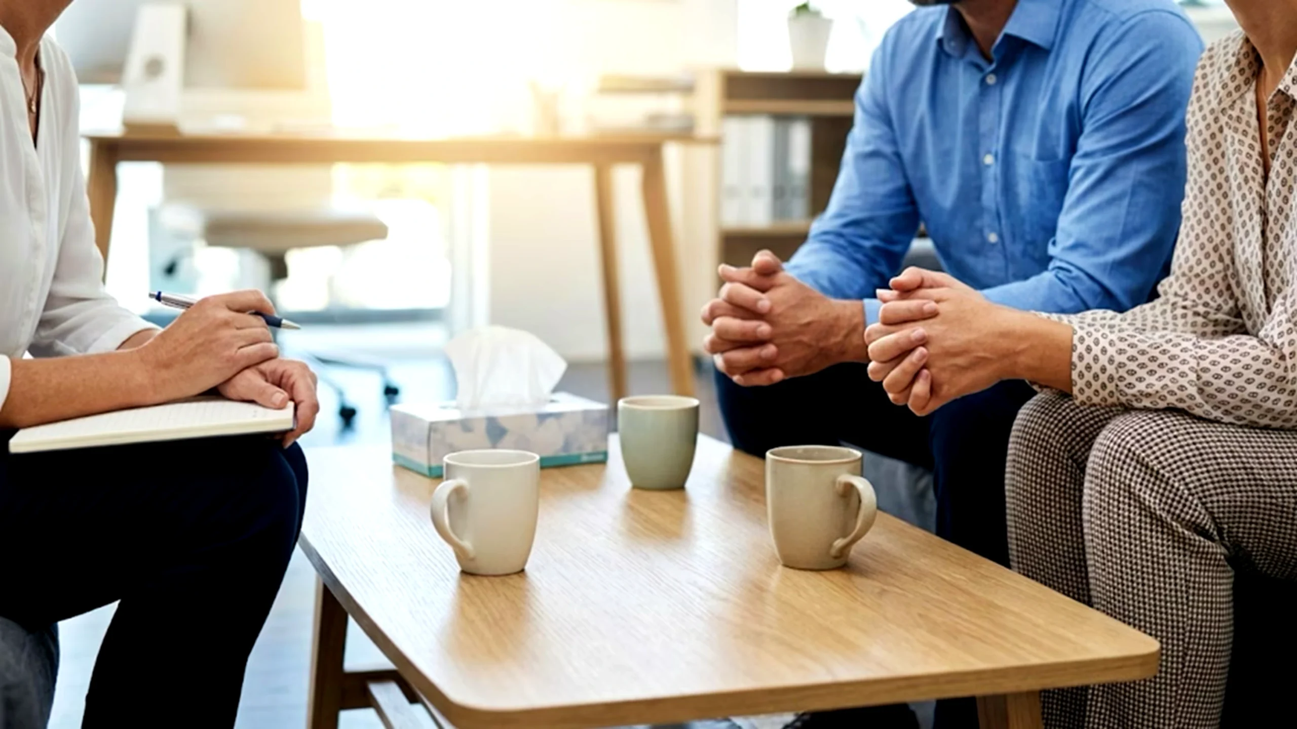 Couple sitting together for therapy and mental health support